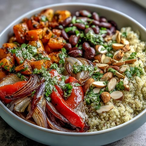 Golden roasted vegetables and fluffy quinoa in a colorful Veggie and Quinoa Power Bowl. 