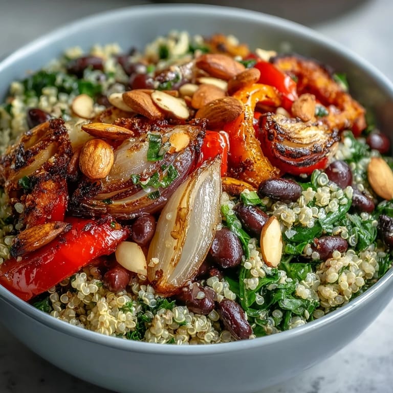 Healthy Veggie and Quinoa Power Bowl with a zesty lemon vinaigrette and pumpkin seeds.